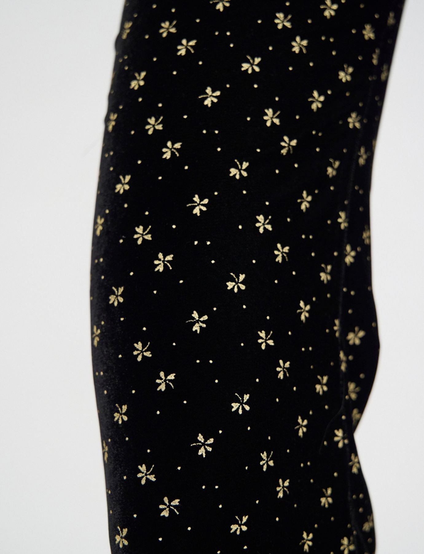 Charlotte trousers in smooth black velvet with gold print