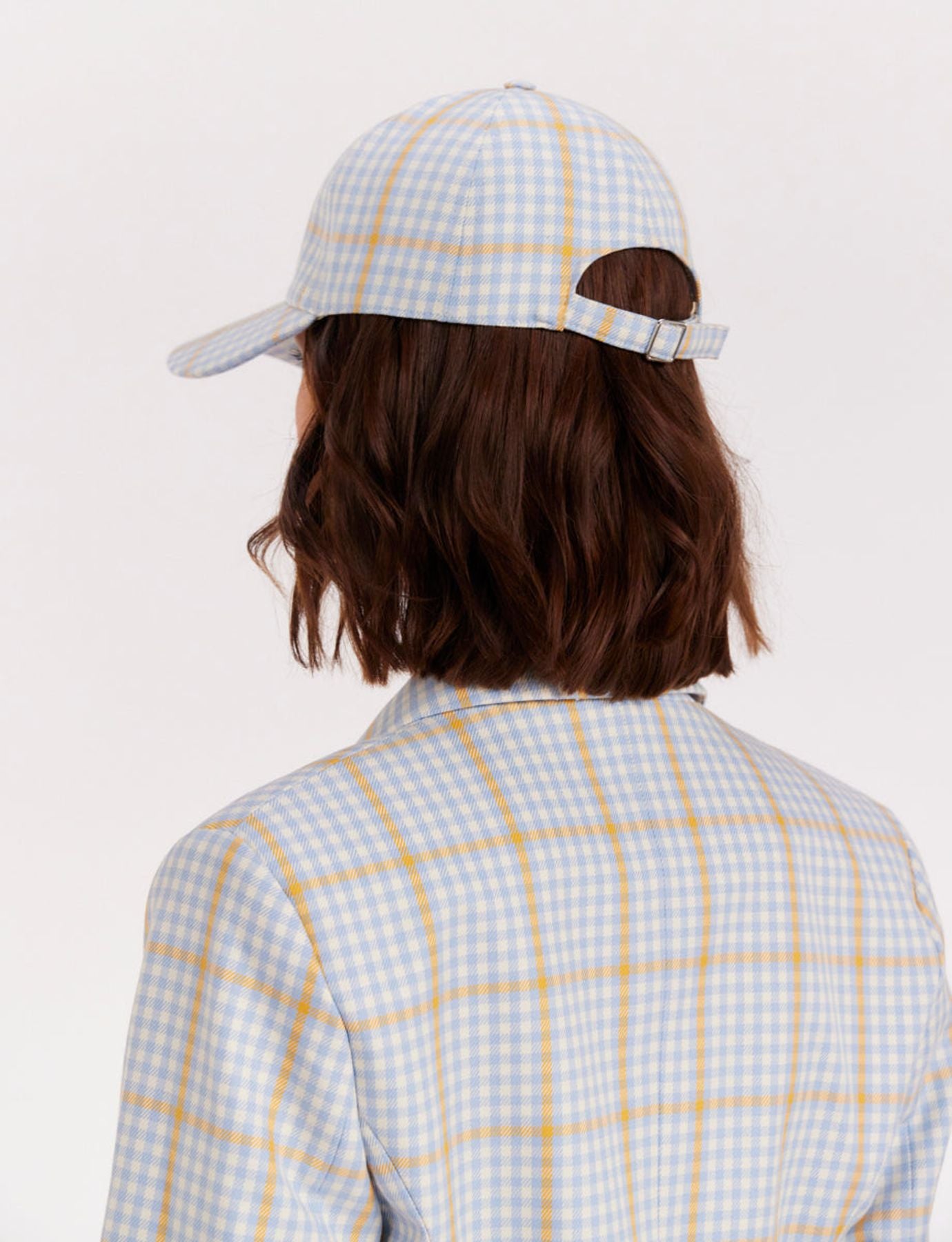 Gorra a cuadros romaní