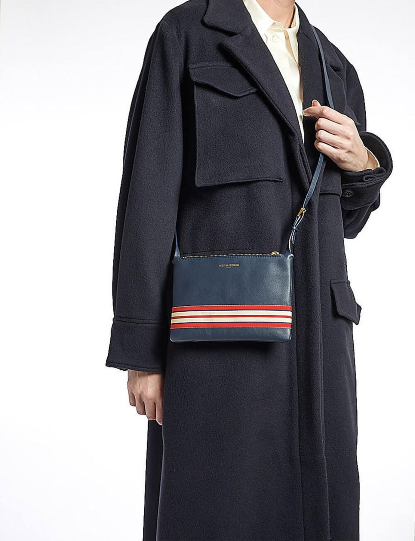 Le Parisien clutch bag in navy leather