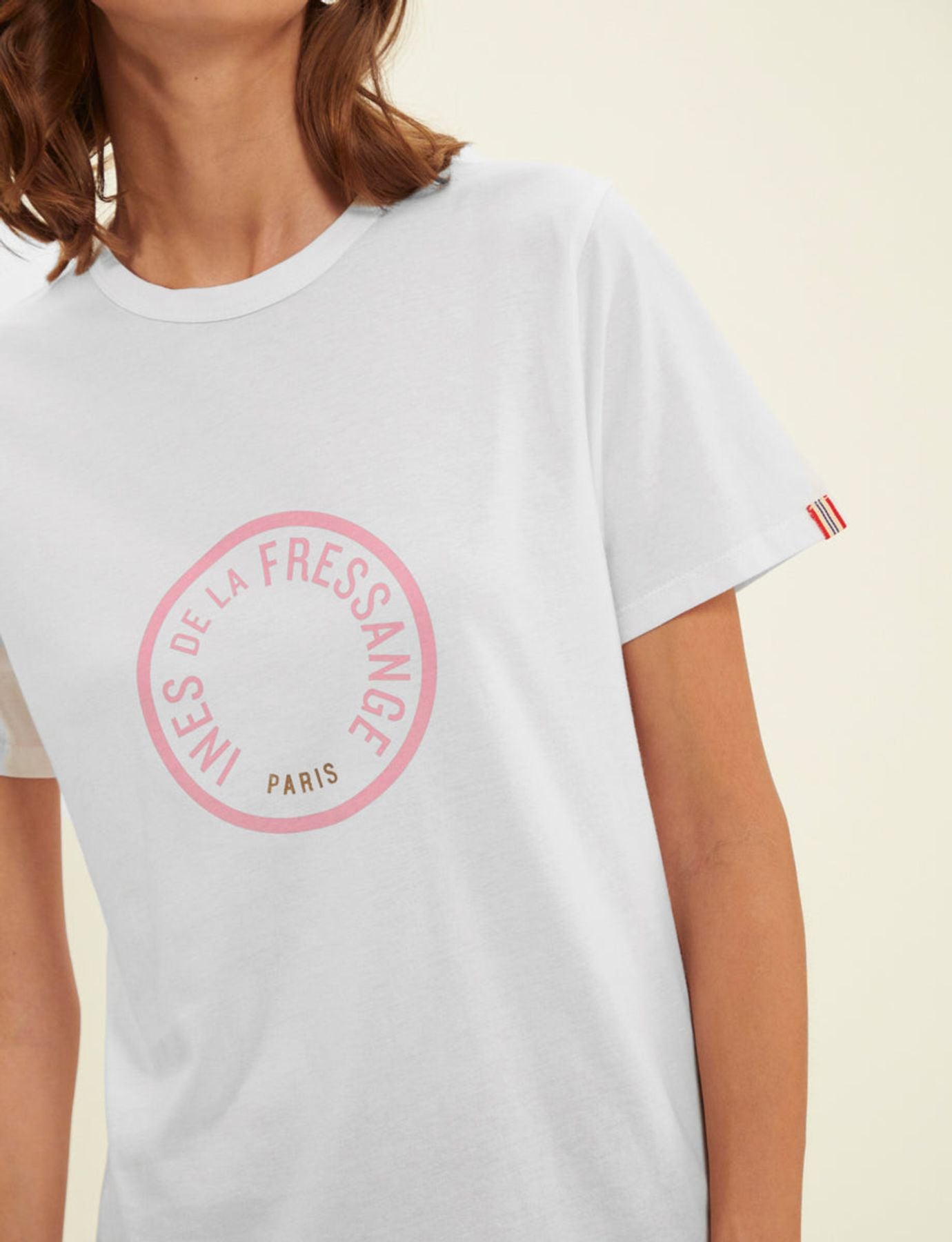 Camiseta Oscar logo blanco rosa