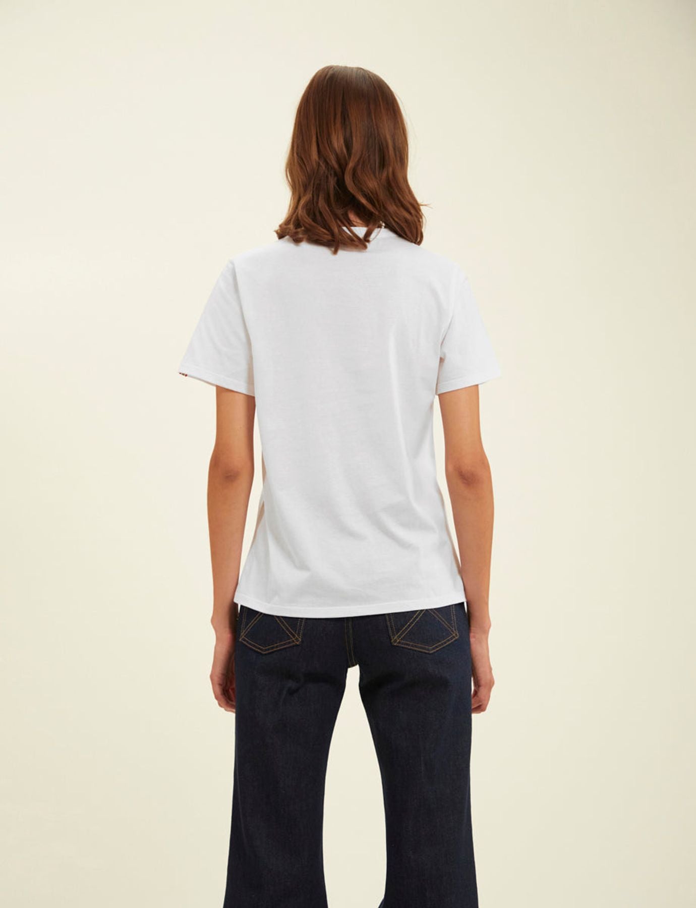 Camiseta Oscar logo blanco rosa