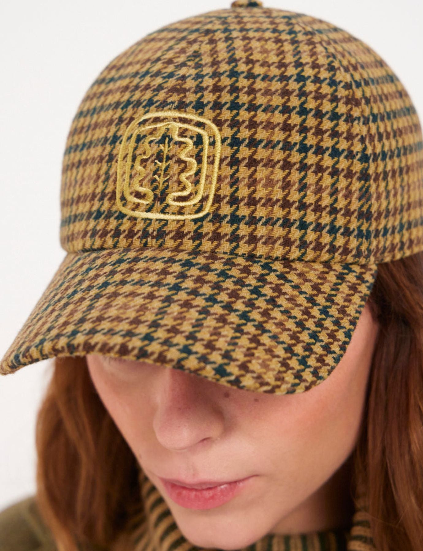 Gorra de pata de gallo romaní