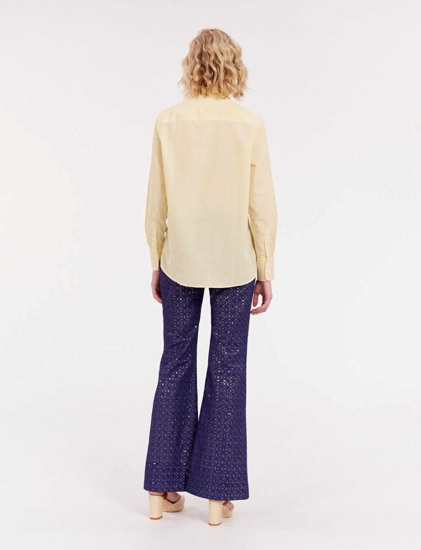 Maureen yellow shirt