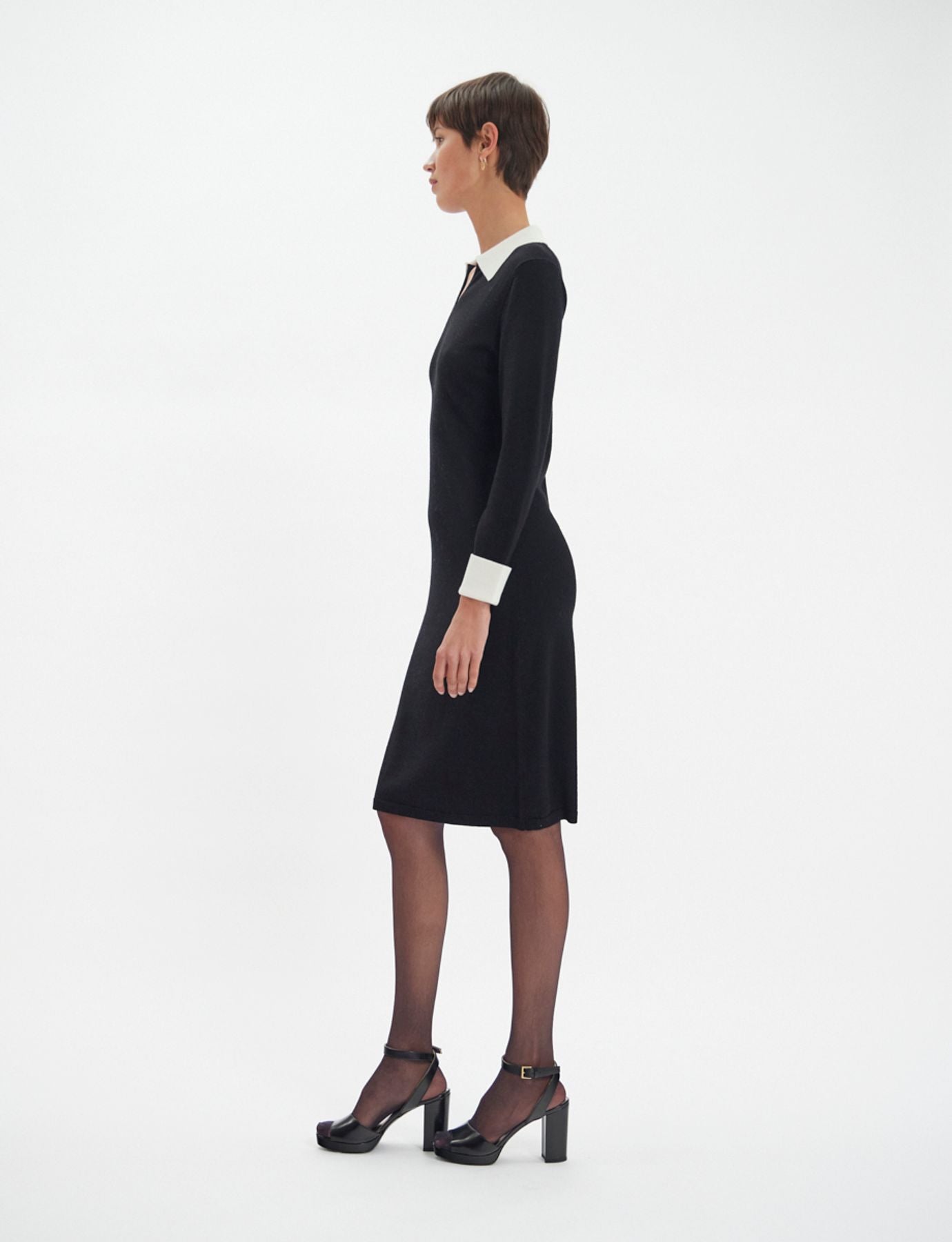 Gabby dress in black merino wool, white cuffs