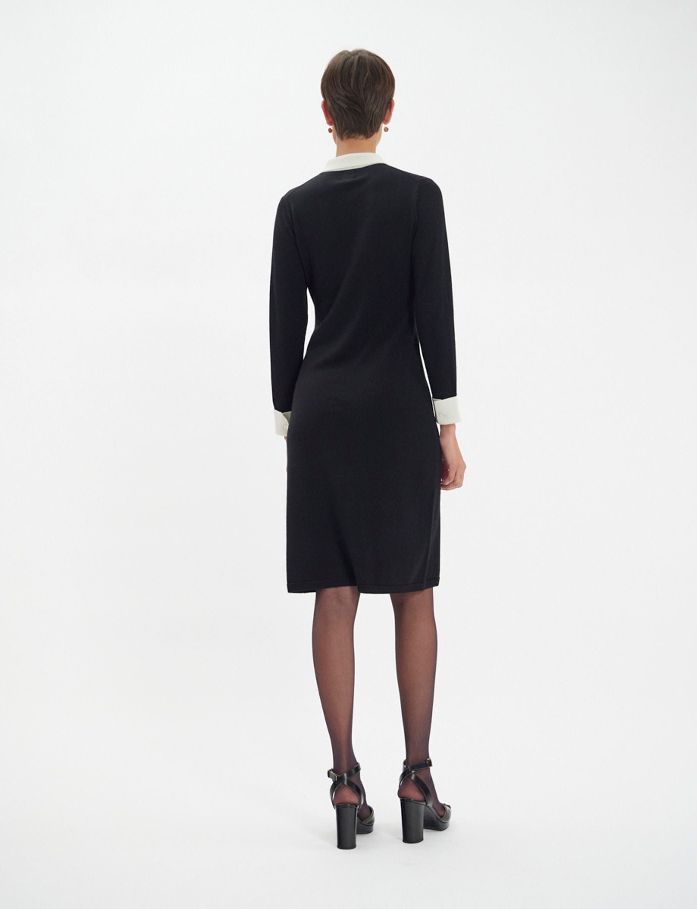 Gabby dress in black merino wool, white cuffs