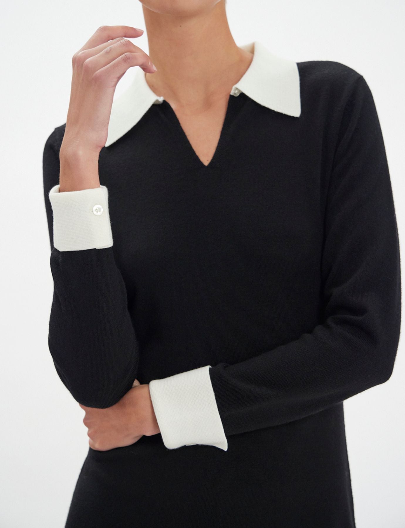 Gabby dress in black merino wool, white cuffs