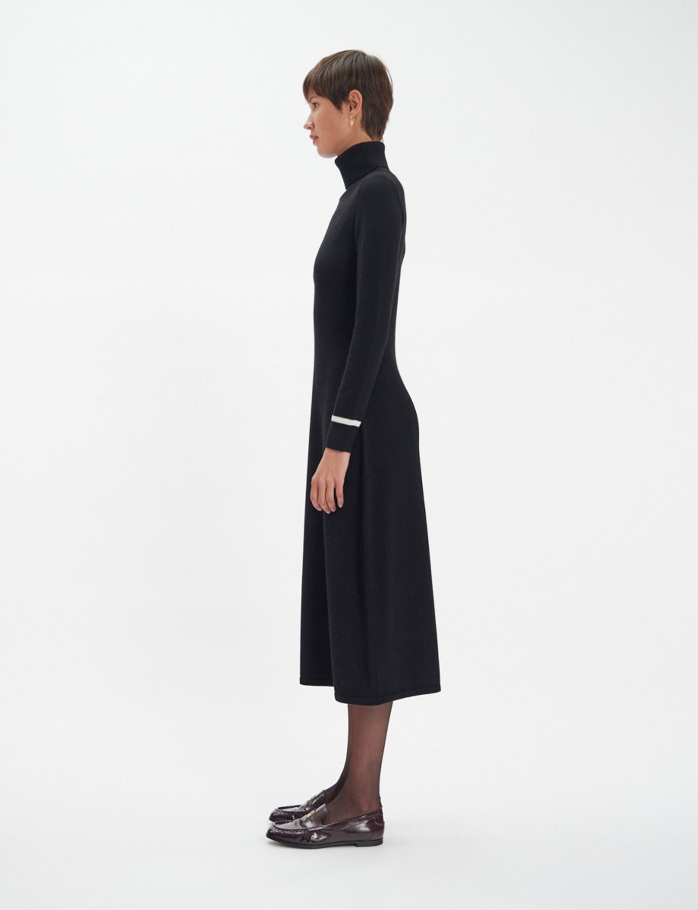 Divine black turtleneck dress with white trim