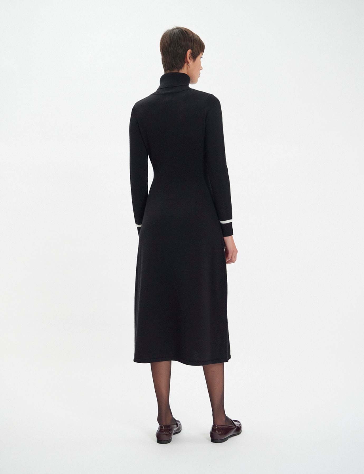 Divine black turtleneck dress with white trim