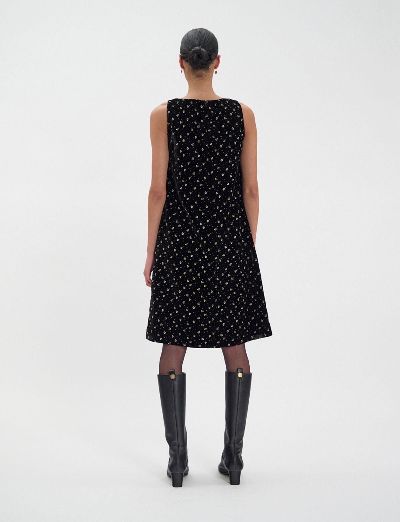 Madeleine dress in smooth black velvet with gold print