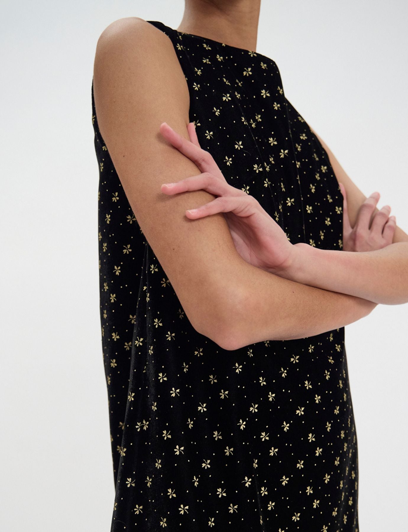 Madeleine dress in smooth black velvet with gold print