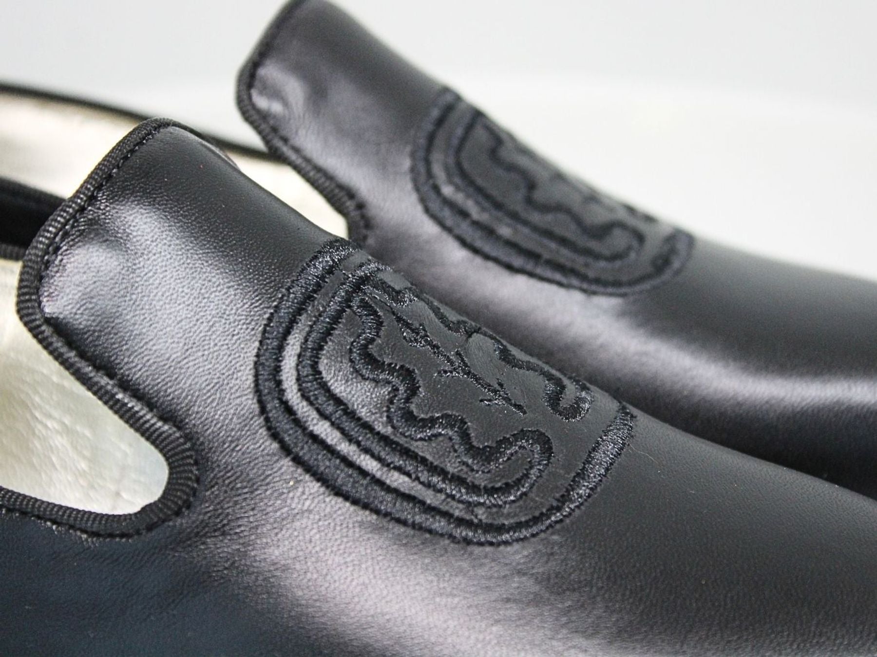 Callie embroidered loafer in black leather